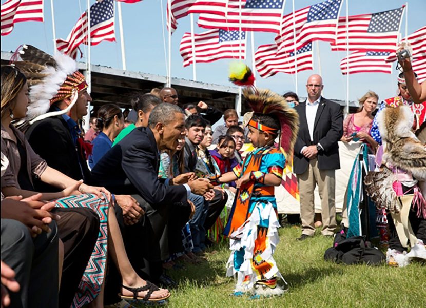 President Barack Obama greets a young boy during the Cannon Ball Flag Day Celebration at the Standing Rock Sioux Tribe Reservation in Cannon Ball, N.D., on June 13. It was the first visit by a sitting president to Indian Country in 14 years.